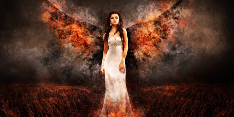 Woman in white with phoenix wings