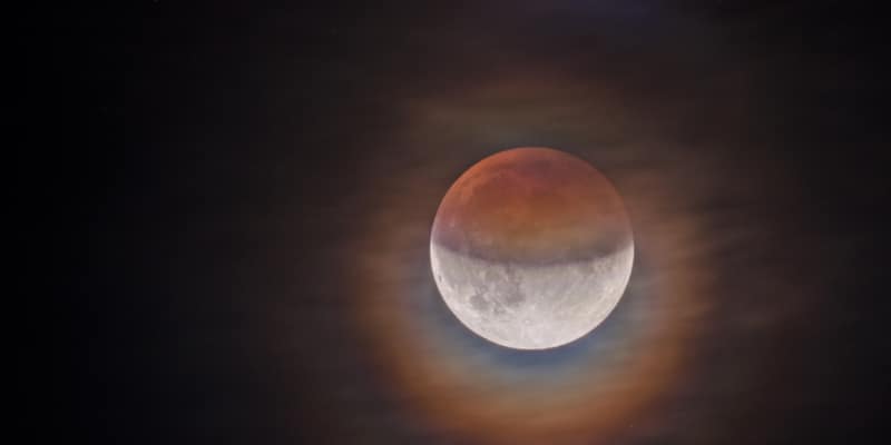 Hybrid eclipse moon in the dark