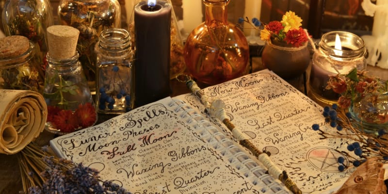Ancient Wisdom old scriptures, spells and candles