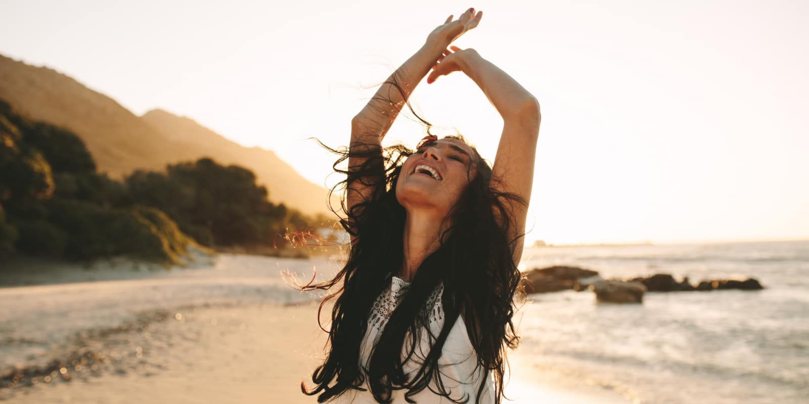 Carefree, woman on beach